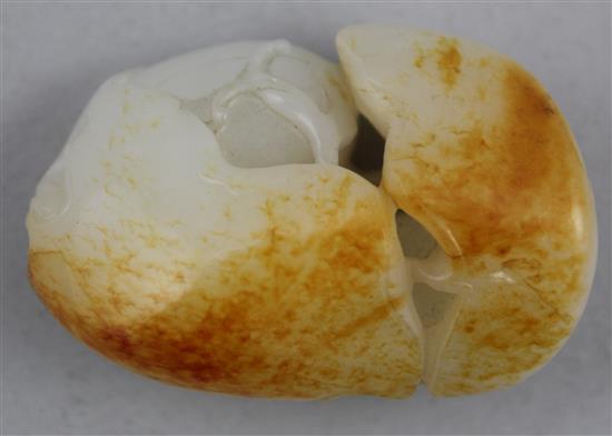 A Chinese white and russet skin jade melon carving, 19th century, 5.1cm